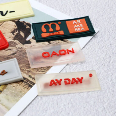 Wholesale custom PVC clothing label with brand logo