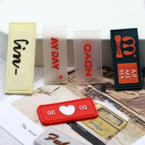 Wholesale custom PVC clothing label with brand logo