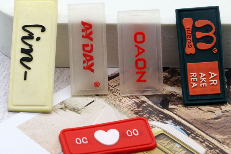 Wholesale custom PVC clothing label with brand logo