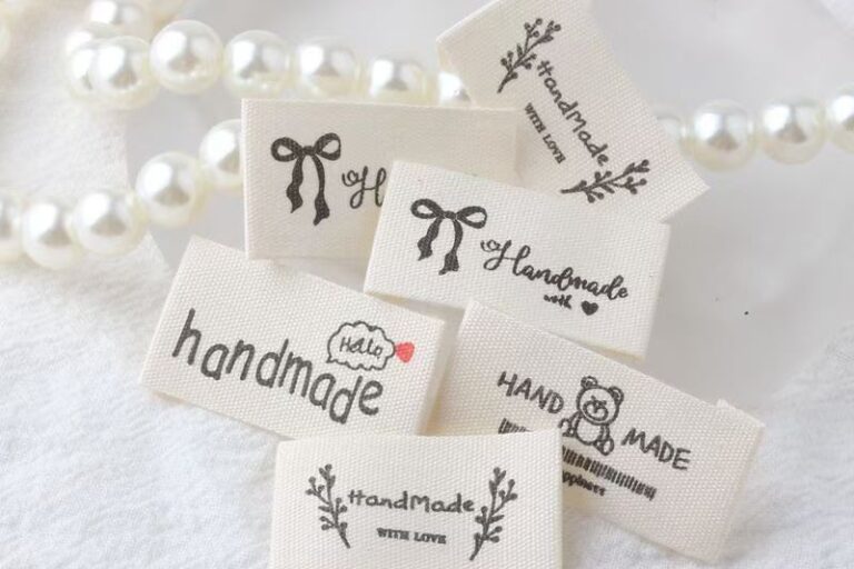 Beige embroidered alphabet woven label for clothing and handmade accessories