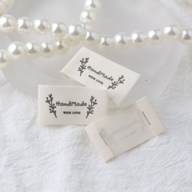 Beige embroidered alphabet woven label for clothing and handmade accessories