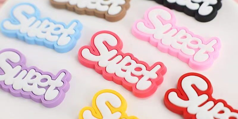 Colorful alphabet PVC decorative label for clothing and packaging