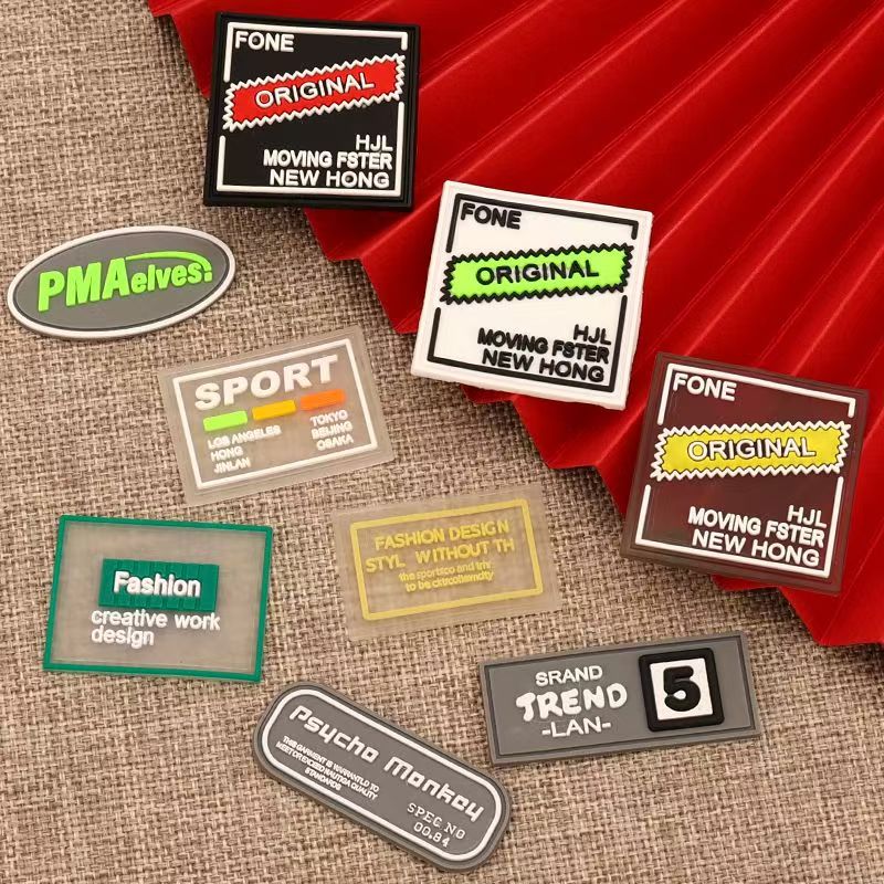 Custom colored transparent PVC clothing patch label for garments