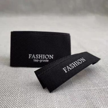 Folded woven neck clothing labels for garments
