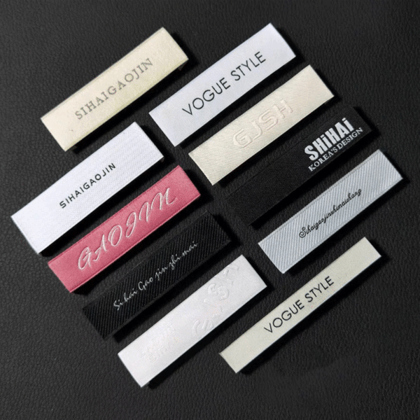 Folded woven neck clothing labels for garments