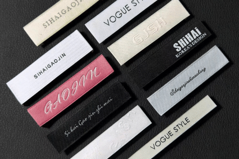 Folded woven neck clothing labels for garments