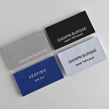 Folded woven neck clothing labels for garments