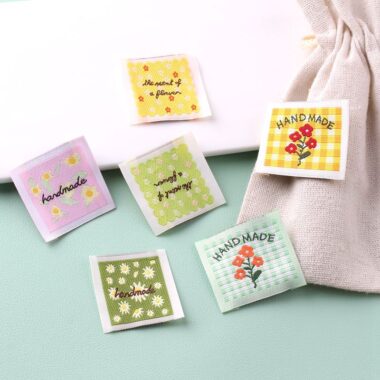 Floral embroidered square clothing labels for fashion garments