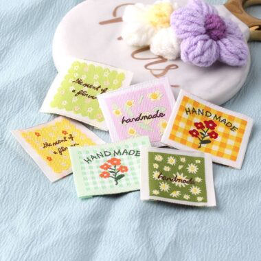 Floral embroidered square clothing labels for fashion garments